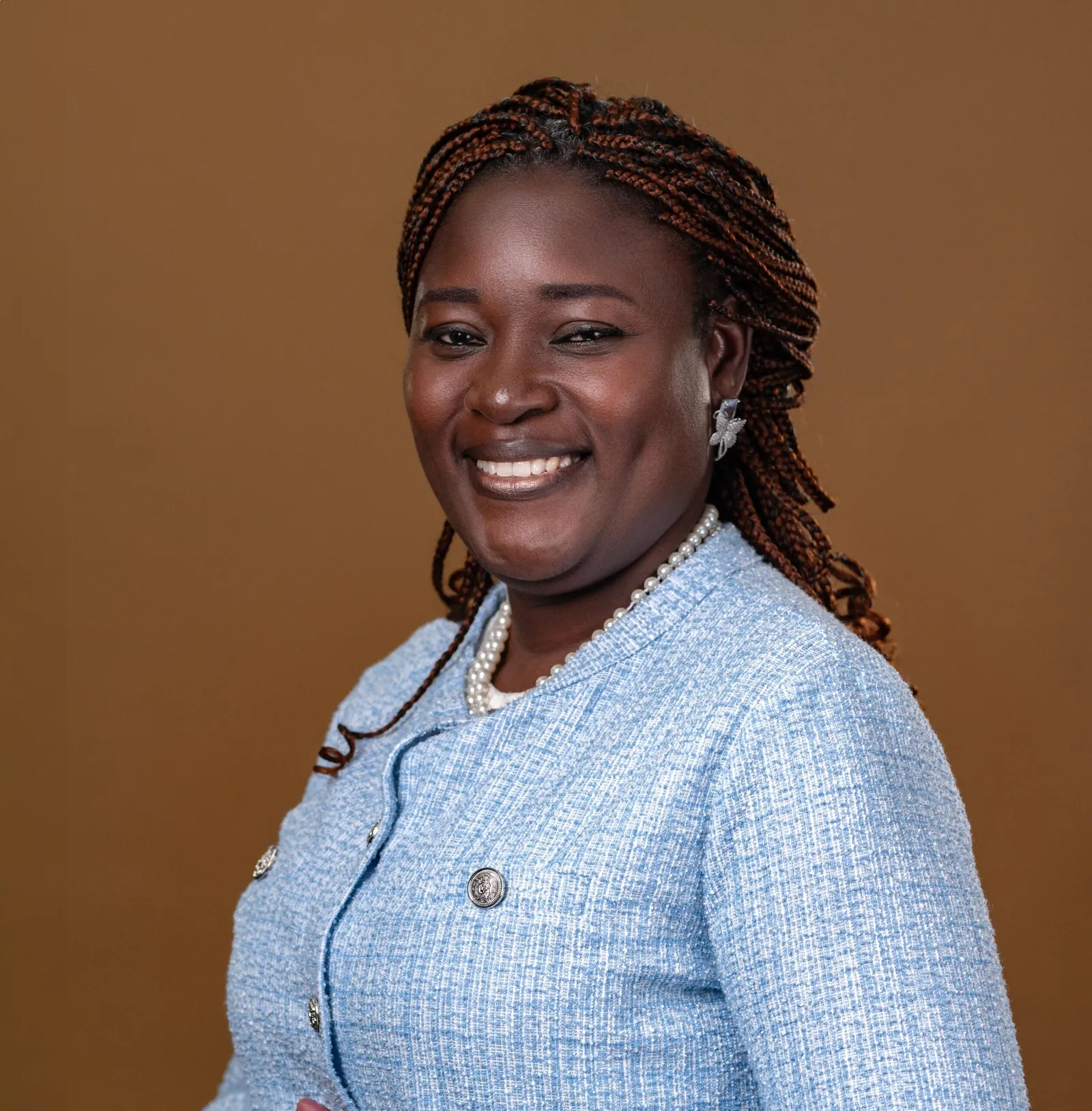 Portrait of Comfort Amina Ochigbo